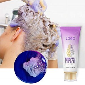 Purple toning shampoo tube beside lathered blonde hair and a purple foam sample.