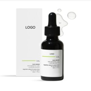 Dark skincare serum dropper bottle and white carton with green accents.