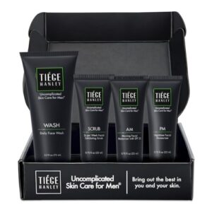 Tiege Hanley men's skincare set with four tubes in an open black presentation box.