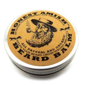Honest Amish beard balm tin with a yellow illustrated lid.